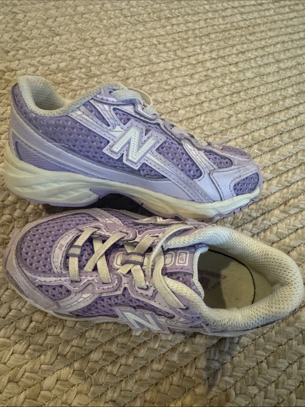 8C 740 New Balance purple sneakers